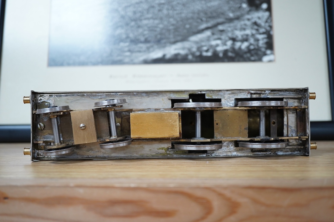 Eleven 0 gauge model railway items including; a bogie stake wagon, two mineral wagons, a North British coal wagon and two further open wagons, a partly constructed brake van, together with a Lima LMS 4F locomotive, two L